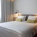 11suites Aigio